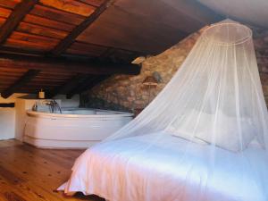 Posteľ alebo postele v izbe v ubytovaní HdeC Hosteria de Castañeda Alojamiento Turistico