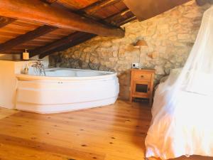 Posteľ alebo postele v izbe v ubytovaní HdeC Hosteria de Castañeda Alojamiento Turistico