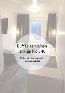 a white room with a sign that reads buffet anaesthesia kalo at SEO Motel Alavieska in Alavieska