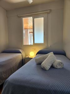 Posteľ alebo postele v izbe v ubytovaní Gerona Center Apartment