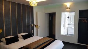 Posteľ alebo postele v izbe v ubytovaní Hôtel d'Angleterre Rouen Centre Gare