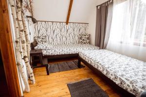 Postel nebo postele na pokoji v ubytování Chata Růženka - Národní park České Švýcarsko