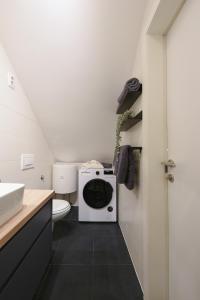 Kúpeľňa v ubytovaní L&R luxury apartment- free parking + 37 fotografií