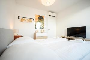 Posteľ alebo postele v izbe v ubytovaní OrestaLiving - Penthouse with private terrace