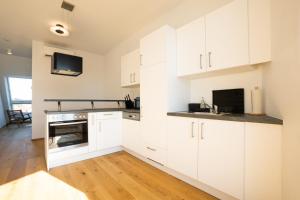 Kuchyňa alebo kuchynka v ubytovaní OrestaLiving - Penthouse with private terrace + 15 fotografií
