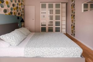 A bed or beds in a room at Casa Patrizi