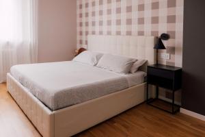 A bed or beds in a room at Casa Patrizi Még 36 kép
