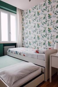 A bed or beds in a room at Casa Patrizi