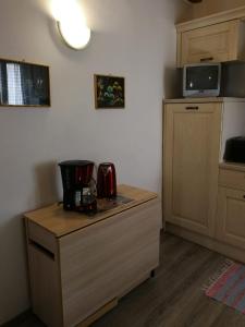 a kitchen with a counter with a coffee maker on it at CasaRiomaggiore "a few steps from the sea" in Riomaggiore