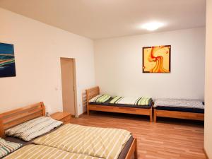 Postel nebo postele na pokoji v ubytování Youth Hostel Service Vienna