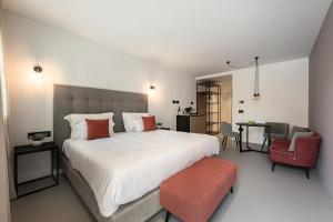 A bed or beds in a room at Residence - Palais Hörtenberg