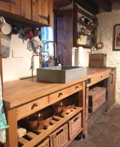 a kitchen with a sink and some pots and pans at A magical hideaway overlooking the river Boyne in Donore