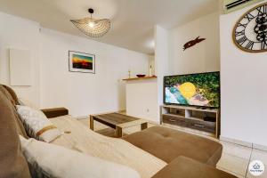 Et tv og/eller underholdning på La Corbeilloise - T2 de 50m2 à Saint-Denis