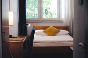 Posteľ alebo postele v izbe v ubytovaní Hotel Na Skarpie - Charzykowy