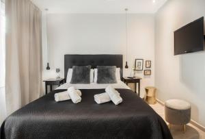 Postel nebo postele na pokoji v ubytování Stay Unique Apartments Aprestadora