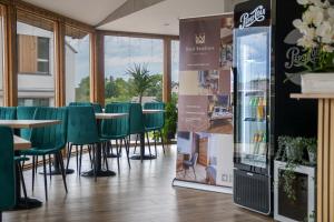 Reštaurácia alebo iné gastronomické zariadenie v ubytovaní Royal Gdansk