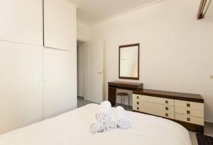 A bed or beds in a room at PanOrama View, Nilie Hospitality MGMT