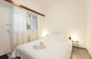 A bed or beds in a room at PanOrama View, Nilie Hospitality MGMT