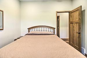 A bed or beds in a room at Lakefront Home with Kayaks By Alexandria and Ski Area!