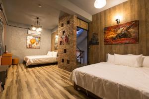 Postel nebo postele na pokoji v ubytování Yi Suo Yen Yu Homestay