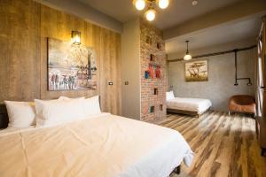 Postel nebo postele na pokoji v ubytování Yi Suo Yen Yu Homestay