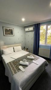 Postel nebo postele na pokoji v ubytování Hotel Shalimar