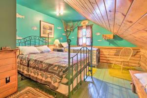 a bedroom with a bed and a wooden ceiling at Handcrafted Log Cabin in Candor Group Getaway! in Candor