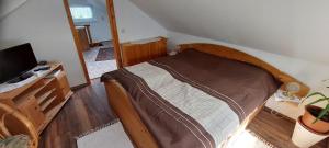Postel nebo postele na pokoji v ubytování FERIENHAUS EICK + 2 fotografie