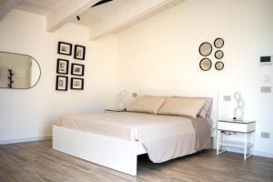 Postel nebo postele na pokoji v ubytování Blanco - MAGNIFICENT B&B Altamura