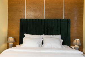 Postel nebo postele na pokoji v ubytování Hotel Castello