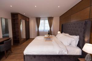 Postel nebo postele na pokoji v ubytování Hotel Castello