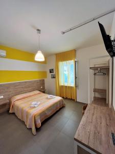 Кровать или кровати в номере Hotel Lido Vieste