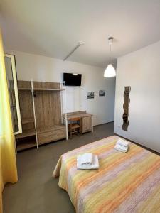 Кровать или кровати в номере Hotel Lido Vieste