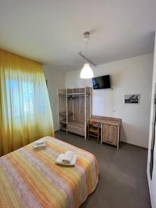 Кровать или кровати в номере Hotel Lido Vieste