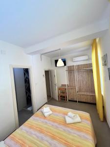 Кровать или кровати в номере Hotel Lido Vieste