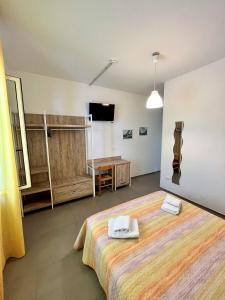 Кровать или кровати в номере Hotel Lido Vieste