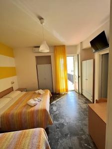 Кровать или кровати в номере Hotel Lido Vieste