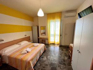 Кровать или кровати в номере Hotel Lido Vieste