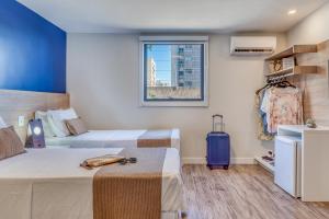 Kuchyň nebo kuchyňský kout v ubytování Cais da Praia Hotel