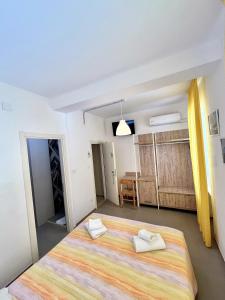 Кровать или кровати в номере Hotel Lido Vieste