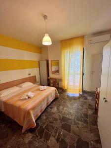 Кровать или кровати в номере Hotel Lido Vieste