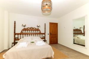 Posteľ alebo postele v izbe v ubytovaní Casa Rural LA BRETONA