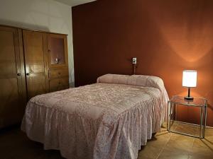 Ліжко або ліжка в номері Casa del Zocalo