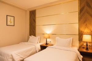 Кровать или кровати в номере ARCHAZOR Mountain Resort