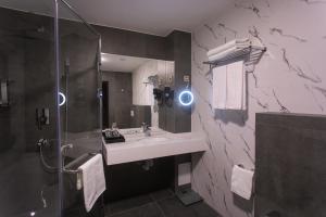 Ванная комната в ARCHAZOR Mountain Resort