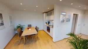 Kuchyň nebo kuchyňský kout v ubytování Lieblingsplatz Neusiedl Appartement - Erhol dich gut