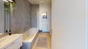 Koupelna v ubytování Lieblingsplatz Neusiedl Appartement - Erhol dich gut