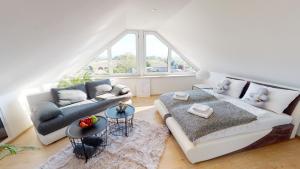 Posezení v ubytování Lieblingsplatz Neusiedl Appartement - Erhol dich gut