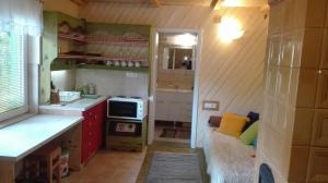 Kuchyň nebo kuchyňský kout v ubytování Zeleni Čardaci etno apartmani