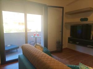 Телевизор и/или развлекательный центр в Eraclea Minoa Apartments